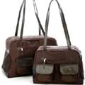 brown dog carrier with leather trim pockets and straps