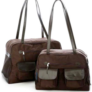 brown dog carrier with leather trim pockets and straps