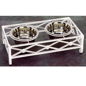 small dog feeder:  antique white iron dog feeder