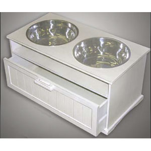 elevated white wood dog diner with dog food storage